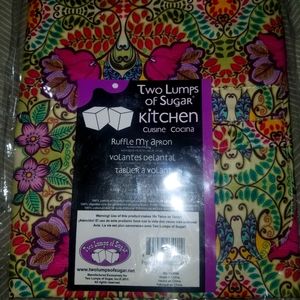 Two lumps of sugar ruffle my apron